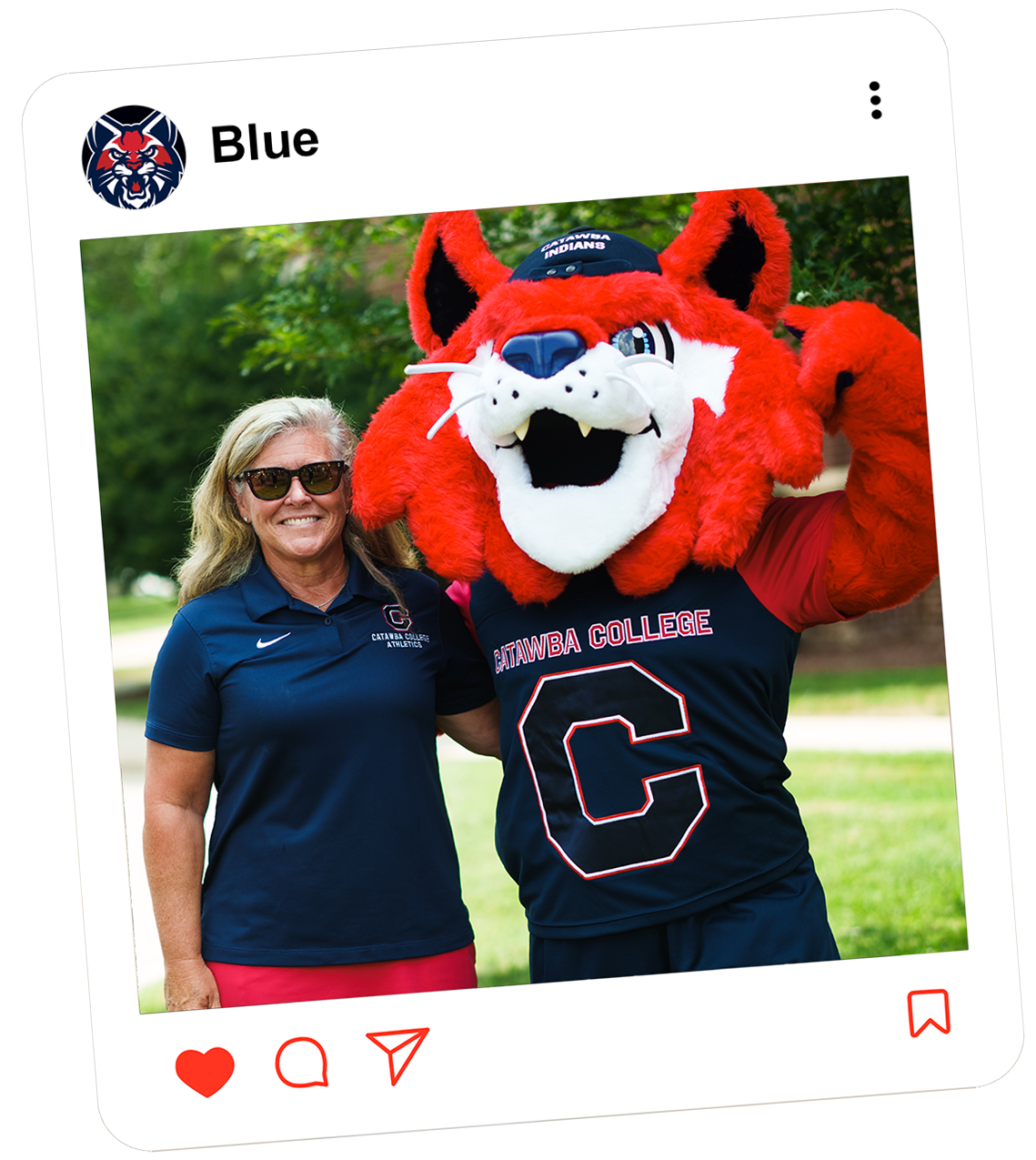 Blue with VP for Athletics Michelle Caddigan