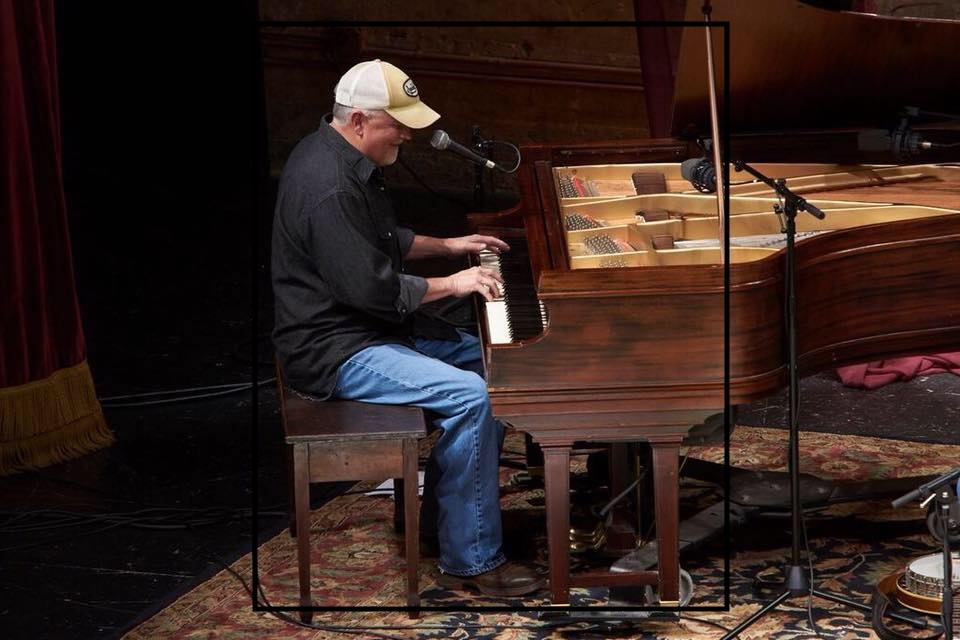 Jeff Little playing the piano