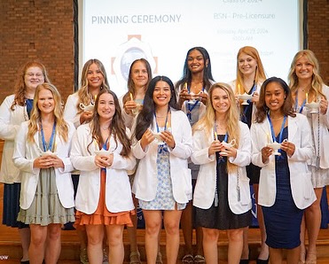 2024 graduates of the nursing program receive their nurses pins