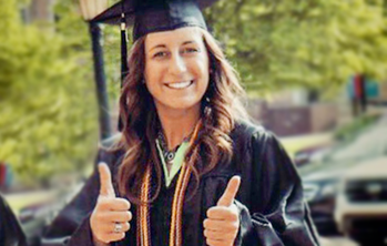 Catawba Graduate giving thumbs up