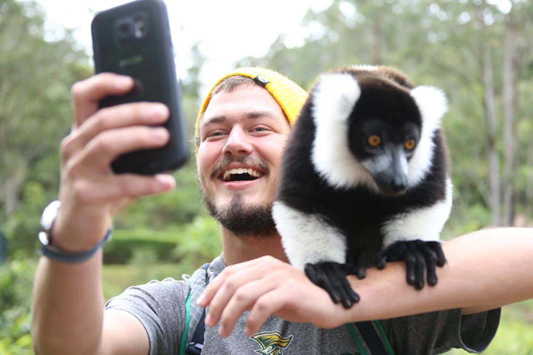 Study Abroad Student with Lemur