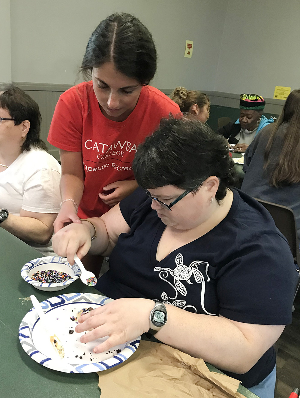 Therapeutic Recreation - Student Helping during Meal